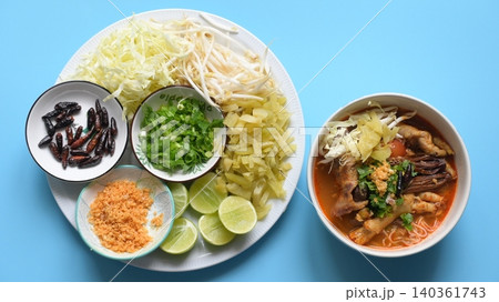 rice vermicelli with northern thai curry sauce on blue background rice vermicelli with northern thai curry sauce on blue background 140361743