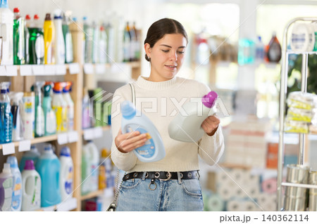 Woman choosing fabric softener 140362114