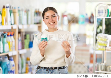 Woman choosing an oral cleansing kit Woman choosing an oral cleansing kit 140362204