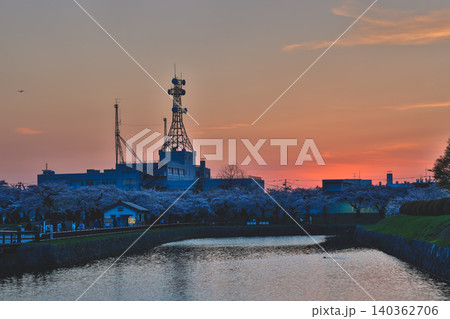 April 25 2026 Urban Communication Towers Silhouetted Against Colorful Sunset April 25 2026 Urban Communication Towers Silhouetted Against Colorful Sunset 140362706