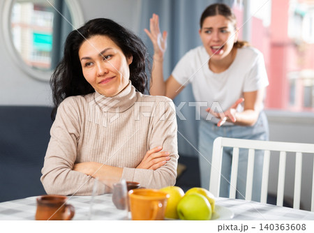 Two women having quarrel at home Two women having quarrel at home 140363608