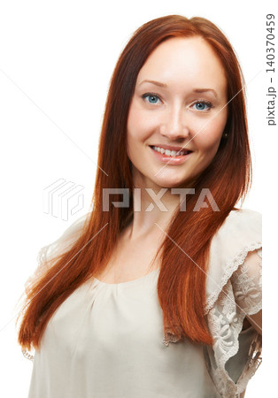 Hair care, red or portrait of happy woman with beauty in white background for a natural shine. Face, ginger model and person in studio with healthy glow, smile or hairstyle results for confidence Hair care, red or portrait of happy woman with beauty in white background for a natural shine. Face, ginger model and person in studio with healthy glow, smile or hairstyle results for confidence 140370459