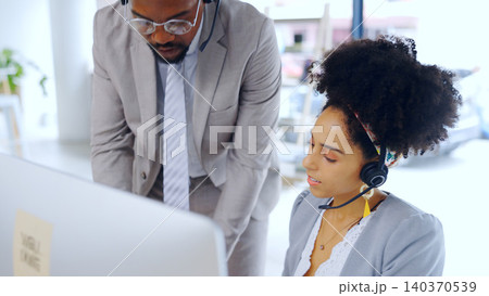 Business people, consultant and call center with coach for customer service, support or help at office. Businessman training woman or intern with headphones in online advice or telesales at workplace Business people, consultant and call center with coach for customer service, support or help at office. Businessman training woman or intern with headphones in online advice or telesales at workplace 140370539