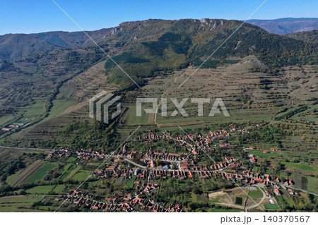 Aerial view of streets of Rimetea, Torocko village in Transylvania, Romania Aerial view of streets of Rimetea, Torocko village in Transylvania, Romania 140370567