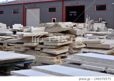 Stacked limestone slabs and tiles Stacked limestone slabs and tiles 140370575