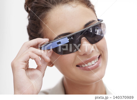 Augmented reality, smart glasses and portrait of woman for fashion, technology or protection from sun. Metaverse, face and hand of model for innovation, eyewear and internet with white background. 140370989