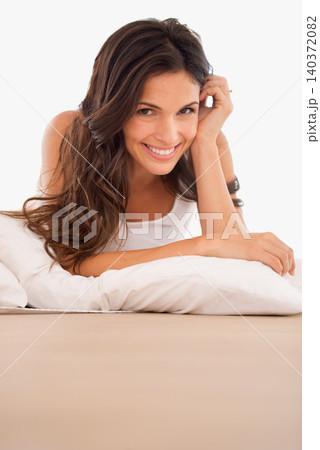 Happy, woman and portrait to wake up in bed, rest and calm on morning in home. Female person, pillow and touch or ready for start of weekend in apartment, comfortable and peace or lazy for wellness Happy, woman and portrait to wake up in bed, rest and calm on morning in home. Female person, pillow and touch or ready for start of weekend in apartment, comfortable and peace or lazy for wellness 140372082