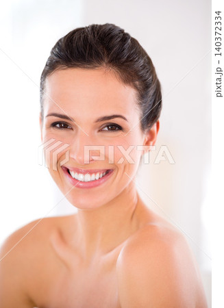 Skincare, portrait and happy woman with beauty in home with shine, smile and luxury skin treatment. Dermatology, relax or face of person in apartment with natural makeup cosmetics, wellness or glow Skincare, portrait and happy woman with beauty in home with shine, smile and luxury skin treatment. Dermatology, relax or face of person in apartment with natural makeup cosmetics, wellness or glow 140372334