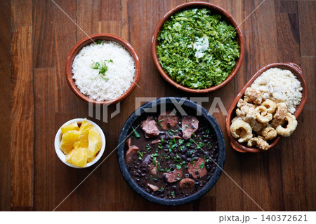 Black beans, food and chilli lunch with above of Mediterranean cooking, vegan and nutrition for diet. Health, green and dish at restaurant or diner with organic salad and vegetable for Mexican dinner 140372621