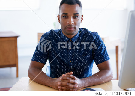 Business, portrait and confident black man at desk in workplace, office or startup company for job of employee. Face, table and serious entrepreneur, creative and designer working in South Africa Business, portrait and confident black man at desk in workplace, office or startup company for job of employee. Face, table and serious entrepreneur, creative and designer working in South Africa 140372971