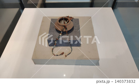 Harappan bead necklace and pottery bowl revealing culture of Indus Valley civilization Pakistan Harappan bead necklace and pottery bowl revealing culture of Indus Valley civilization Pakistan 140373832