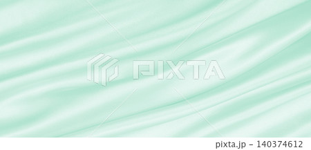 Smooth elegant green silk or satin luxury cloth texture as abstract background. Luxurious background design Smooth elegant green silk or satin luxury cloth texture as abstract background. Luxurious background design 140374612