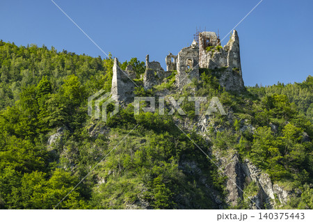 Strecno Castle ruins on Zilina region forested hill Strecno Castle ruins on Zilina region forested hill 140375443
