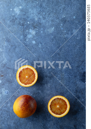 Blood oranges on a blue background with copy space Blood oranges on a blue background with copy space 140375685