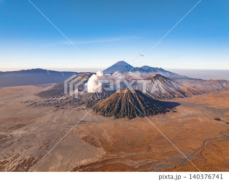 Amazing Mount Bromo volcano during sunrise from king kong viewpoint on Mountain Penanjakan in Bromo Tengger Semeru National Park,East Java,Indonesia.Nature landscape background Amazing Mount Bromo volcano during sunrise from king kong viewpoint on Mountain Penanjakan in Bromo Tengger Semeru National Park,East Java,Indonesia.Nature landscape background 140376741