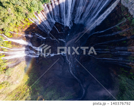 Aerial view of the Tumpak Sewu Waterfalls also known as Coban Sewu.Beautiful Tumpak Sewu Waterfalls are a tourist attraction in East Java, Indonesia.Amazing travel destination in asia 140376792