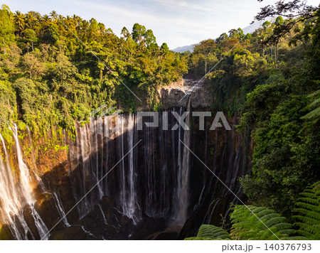 Aerial view of the Tumpak Sewu Waterfalls also known as Coban Sewu.Beautiful Tumpak Sewu Waterfalls are a tourist attraction in East Java, Indonesia.Amazing travel destination in asia 140376793