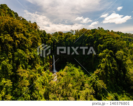 Amazing Beautiful waterfall in tropical rainforest in national park at East Java, Indonesia 140376801