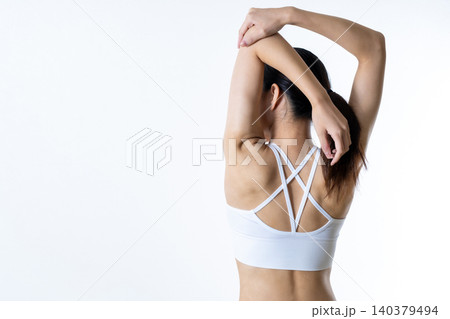 体を鍛えてるスレンダーな女性 後ろ姿でポーズ ストレッチ 筋トレ女子 減量 ダイエット 体を鍛えてるスレンダーな女性 後ろ姿でポーズ ストレッチ 筋トレ女子 減量 ダイエット 140379494