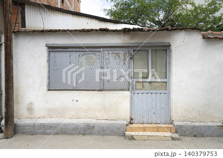 An old locked double door 140379753