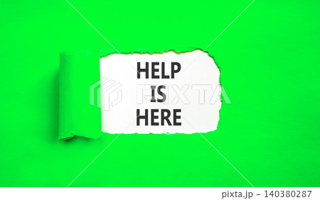 Help is here and support words symbol. Concept words Help is here on beautiful white paper. Beautiful green background. Business help is here and support concept. Copy space. 140380287