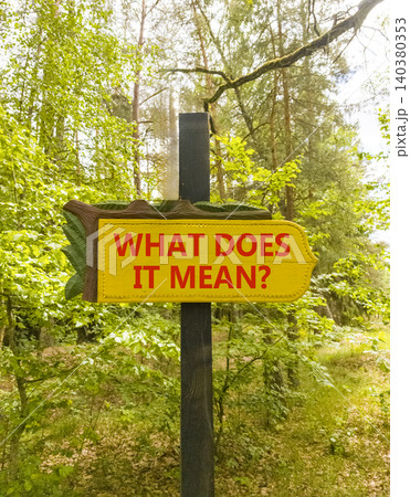 What does it mean words symbol. Concept words What does it mean on beautiful yellow road sign. Beautiful green forest background. Business What does it mean motivational support concept. Copy space. What does it mean words symbol. Concept words What does it mean on beautiful yellow road sign. Beautiful green forest background. Business What does it mean motivational support concept. Copy space. 140380353