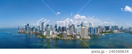 Aerial panorama of Brickell in Miami. Downtown Miami skyline on a sunny day. Scenic view of Miami Beach and Brickell. Miamis Skyscrapers. Brickell famous landmarks. Miami downtown landscape. Aerial panorama of Brickell in Miami. Downtown Miami skyline on a sunny day. Scenic view of Miami Beach and Brickell. Miamis Skyscrapers. Brickell famous landmarks. Miami downtown landscape. 140380634