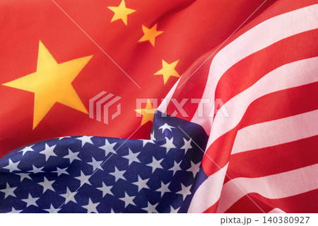 Flags of the United States and China together. Concept of geopolitical tension between the two countries. International relations. political negotiation Flags of the United States and China together. Concept of geopolitical tension between the two countries. International relations. political negotiation 140380927