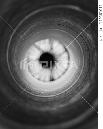 Monochrome circular tunnel with dark center Monochrome circular tunnel with dark center 140381011