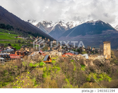 Distance view of the sunny Mestia, Svaneti mountain region in Georgia. Distance view of the sunny Mestia, Svaneti mountain region in Georgia. 140381194