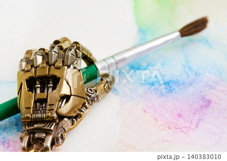 Robot hand holding paintbrush creating watercolor ai art Robot hand holding paintbrush creating watercolor ai art 140383010