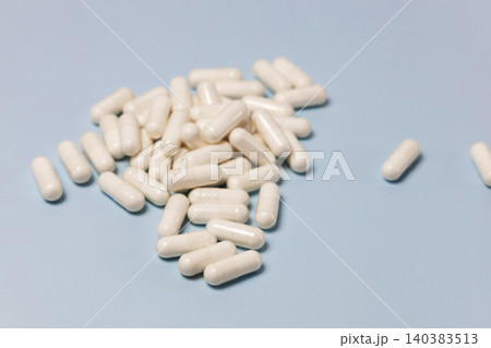 White capsules for healthcare and wellness concept White capsules for healthcare and wellness concept 140383513