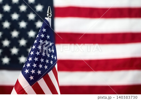 American flag desktop miniature with blurred background symbol usa American flag desktop miniature with blurred background symbol usa 140383730