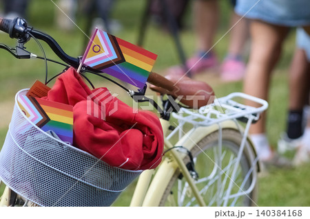 Bicycle carrying progress pride flags promoting lgbtq inclusion 140384168