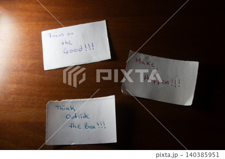 Three Handwritten Motivational Notes on Rustic Wooden Background. Three Handwritten Motivational Notes on Rustic Wooden Background. 140385951