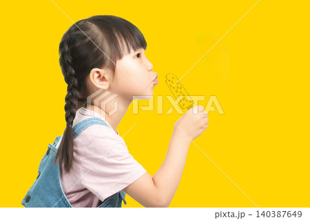 Funny Child Looking at Hand Drawn Popsicle Icon Expressing Snack Craving Concept 140387649