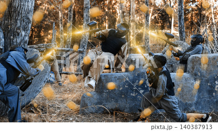 Attack of the paintball team on the enemy at army training ground 140387913