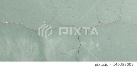green cracked paint on a wall green cracked paint on a wall 140388005