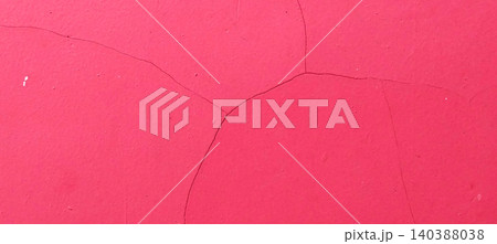 Cracked Red Wall Texture with Worn-Looking Paint Surface 140388038