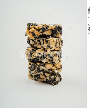 Stacked Peanut and Black Sesame Brittle Bars Stacked Peanut and Black Sesame Brittle Bars 140388600