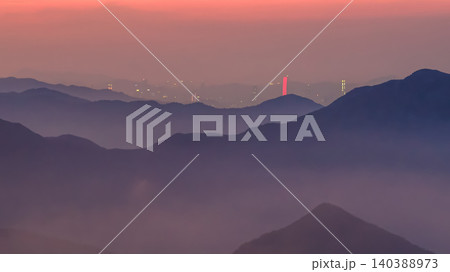 July 8 2022 Hong Kong mountains dramatic sunset rays July 8 2022 Hong Kong mountains dramatic sunset rays 140388973