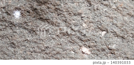 Natural grey granite texture with mineral patterns. 140391033