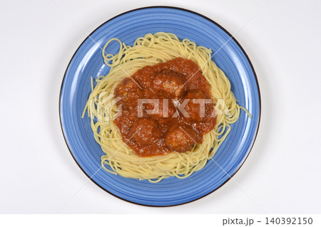 Spaghetti and meatballs in tomato sauce on white background Spaghetti and meatballs in tomato sauce on white background 140392150