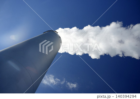detail of chimney with smoke of CopenHill innovative waste to energy power plant in Copenhagen It perfectly merges urban recreation with green energy detail of chimney with smoke of CopenHill innovative waste to energy power plant in Copenhagen It perfectly merges urban recreation with green energy 140394294