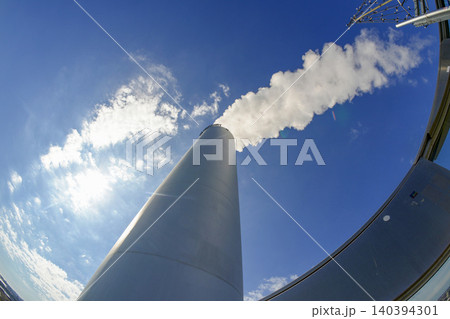 detail of chimney with smoke of CopenHill innovative waste to energy power plant in Copenhagen It perfectly merges urban recreation with green energy detail of chimney with smoke of CopenHill innovative waste to energy power plant in Copenhagen It perfectly merges urban recreation with green energy 140394301