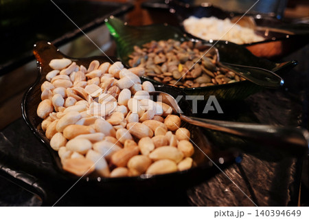 Close up peanuts is snack in black plate 140394649