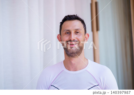Portrait of happy smiling man in sport activewear Portrait of happy smiling man in sport activewear 140397987