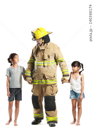 Firefighter rescuing two children isolated on white background Firefighter rescuing two children isolated on white background 140398174