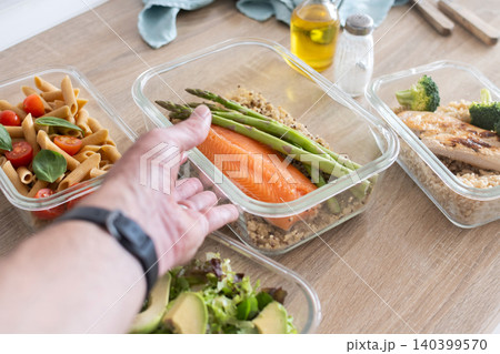 Healthy Meal Prep Containers with Salmon, Chicken and Fresh Vegetables Healthy Meal Prep Containers with Salmon, Chicken and Fresh Vegetables 140399570
