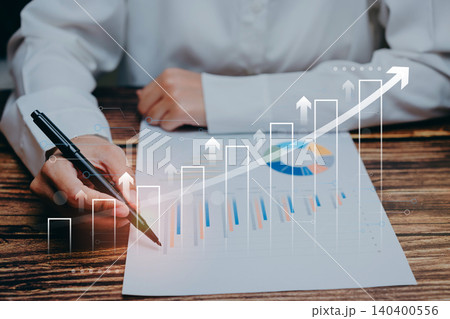 Business Growth Analysis and Reporting with Financial Charts and Increase Indicators in Office Environment Business Growth Analysis and Reporting with Financial Charts and Increase Indicators in Office Environment 140400556